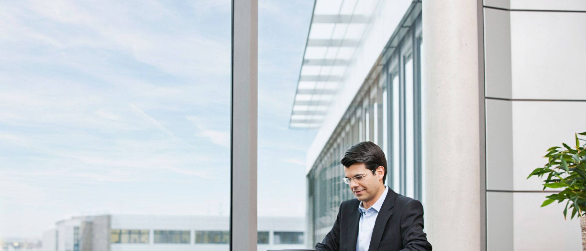 image of business executive working on laptop