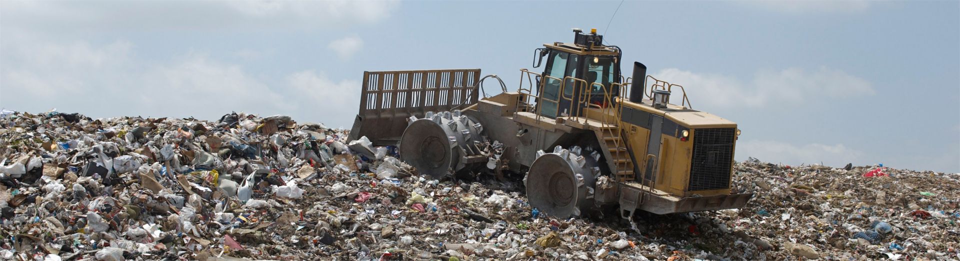 Landfill compactor in a landfill