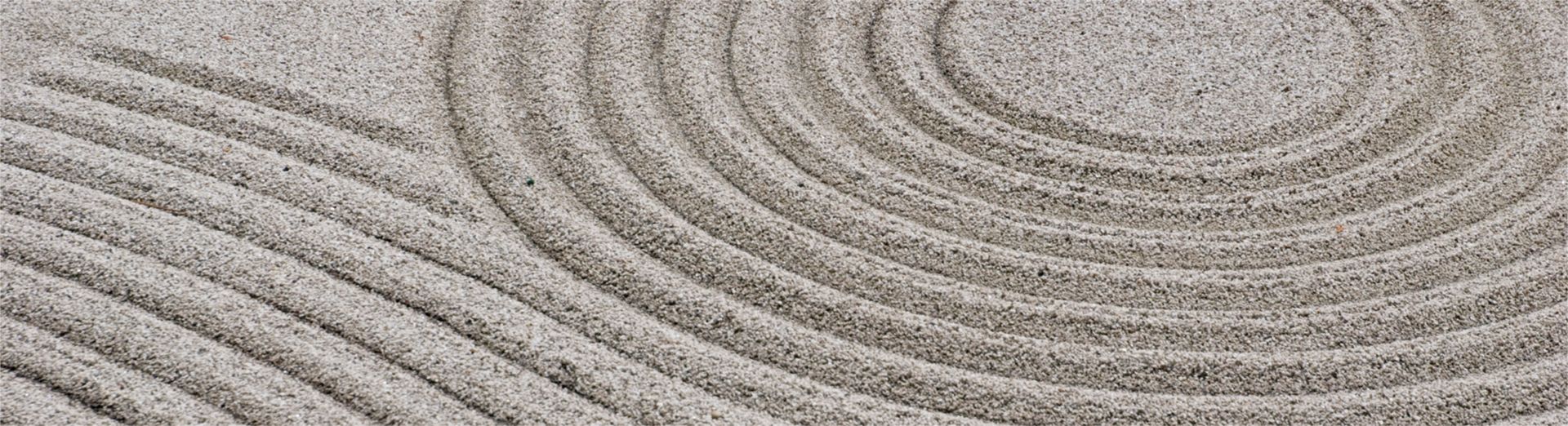 Lines in sand depicting a large circle.