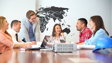 employee discussing spatial data in a meeting