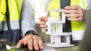 two engineers building a model