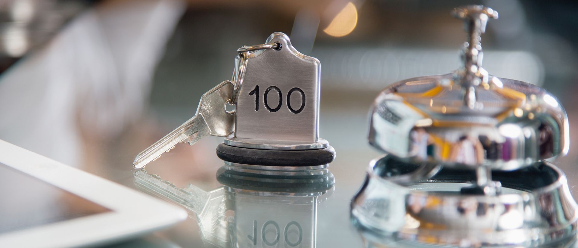 Hotel room key and desk bell