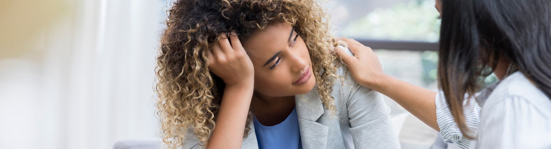 Woman talking to therapist about her mental health