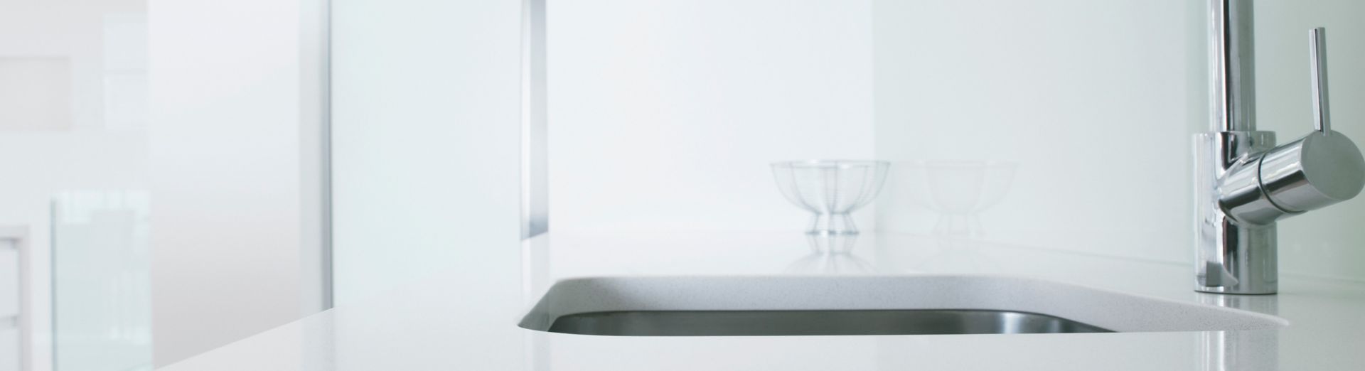 Modern sink and faucet representing a faucet from Moen, an SAP customer
