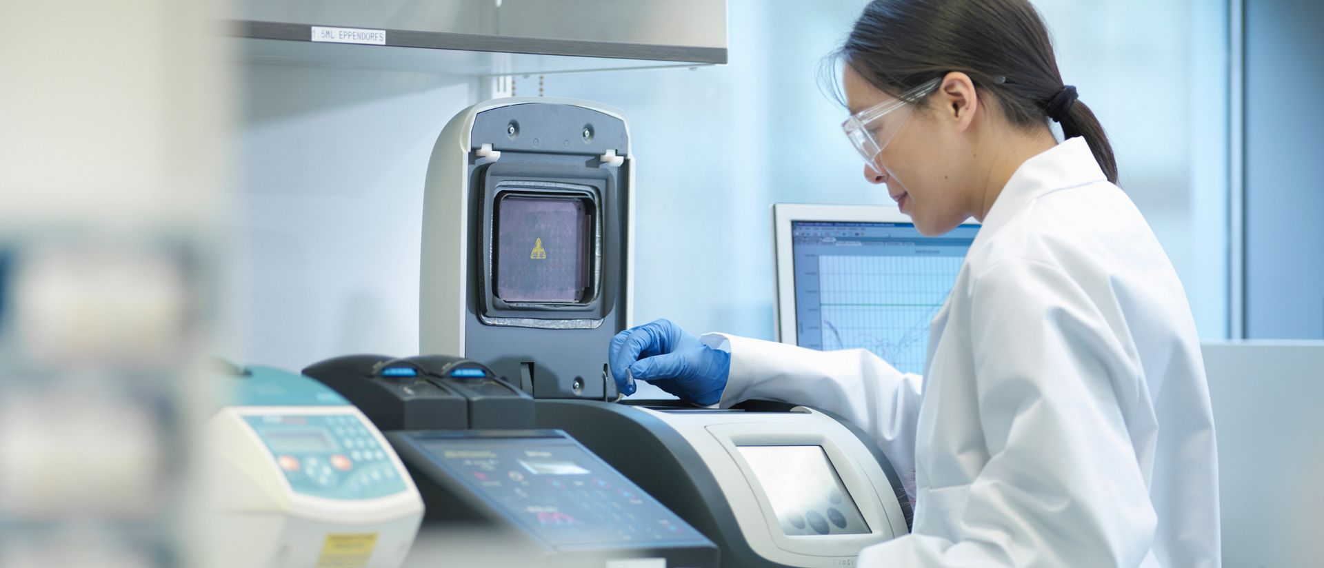 Female pharmaceutical scientist working in a lab.