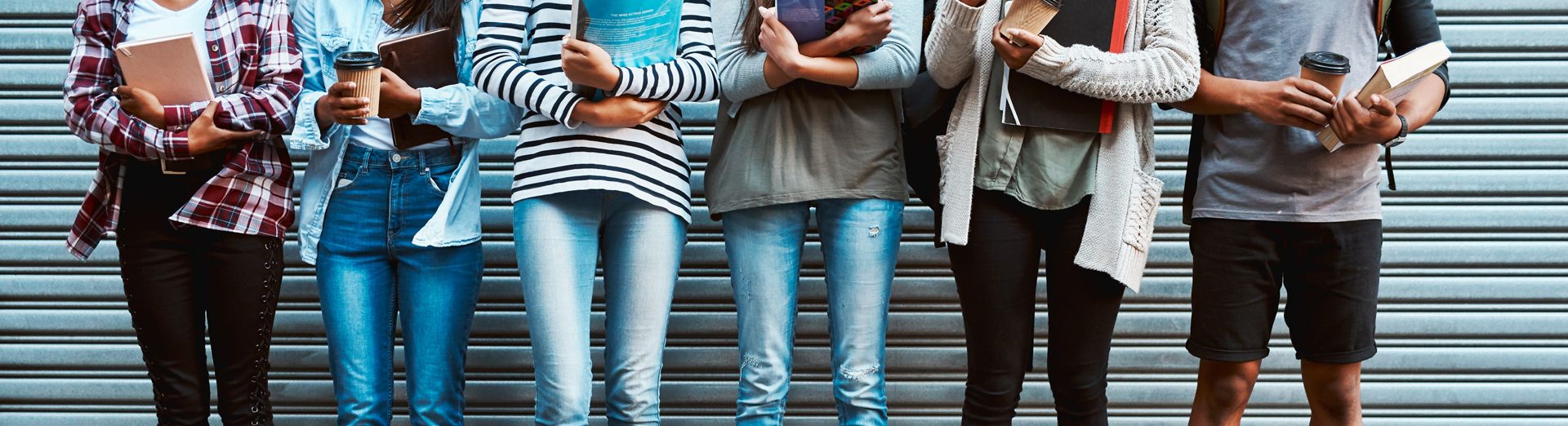 A group of university students standing side by side