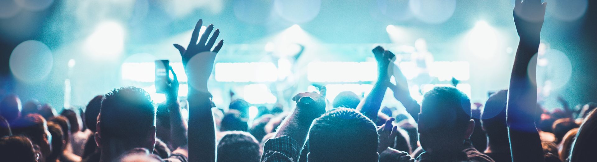  Arms Raised Concert - stock photo