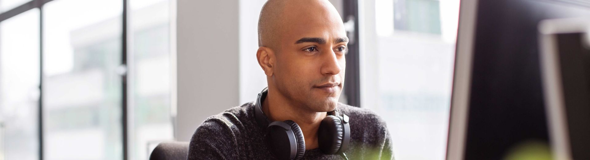 Man at desk taking online training