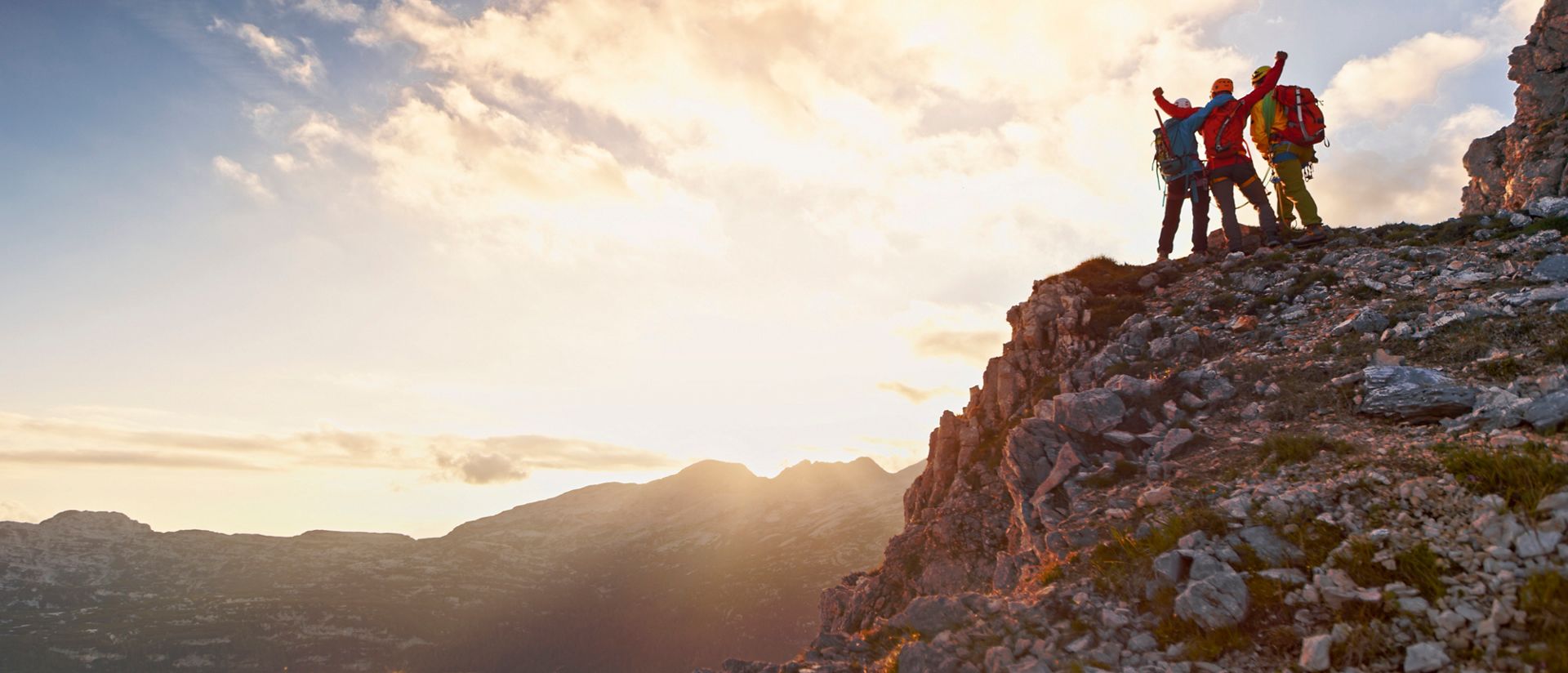 People standing on top of a mountain