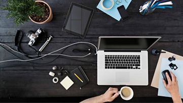  a laptop and tablet on table