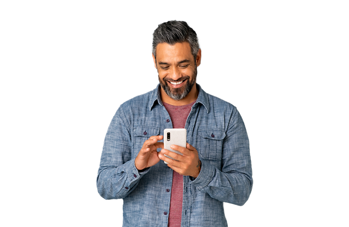 Man laughing while using his phone