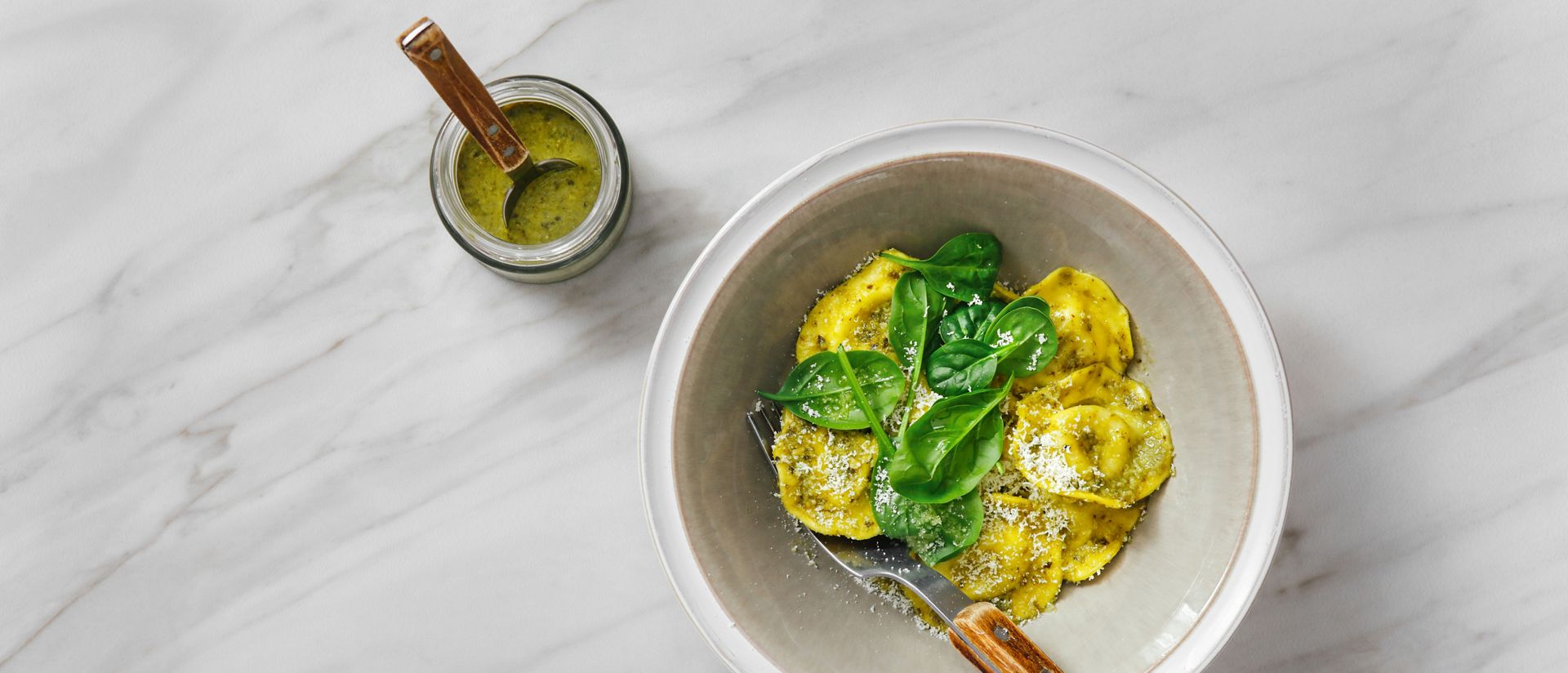 Spinach and ricotta ravioli with basil pesto