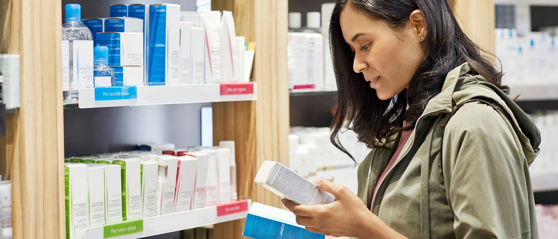 Customer reviewing products in a pharmacy