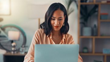 woman typing on a computer