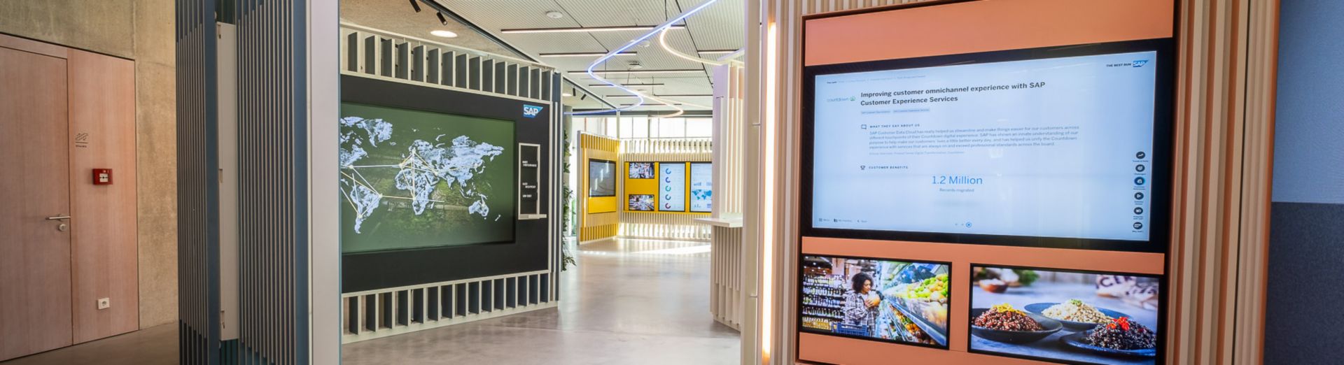view inside SAP Experience Center Walldorf with large screen displays